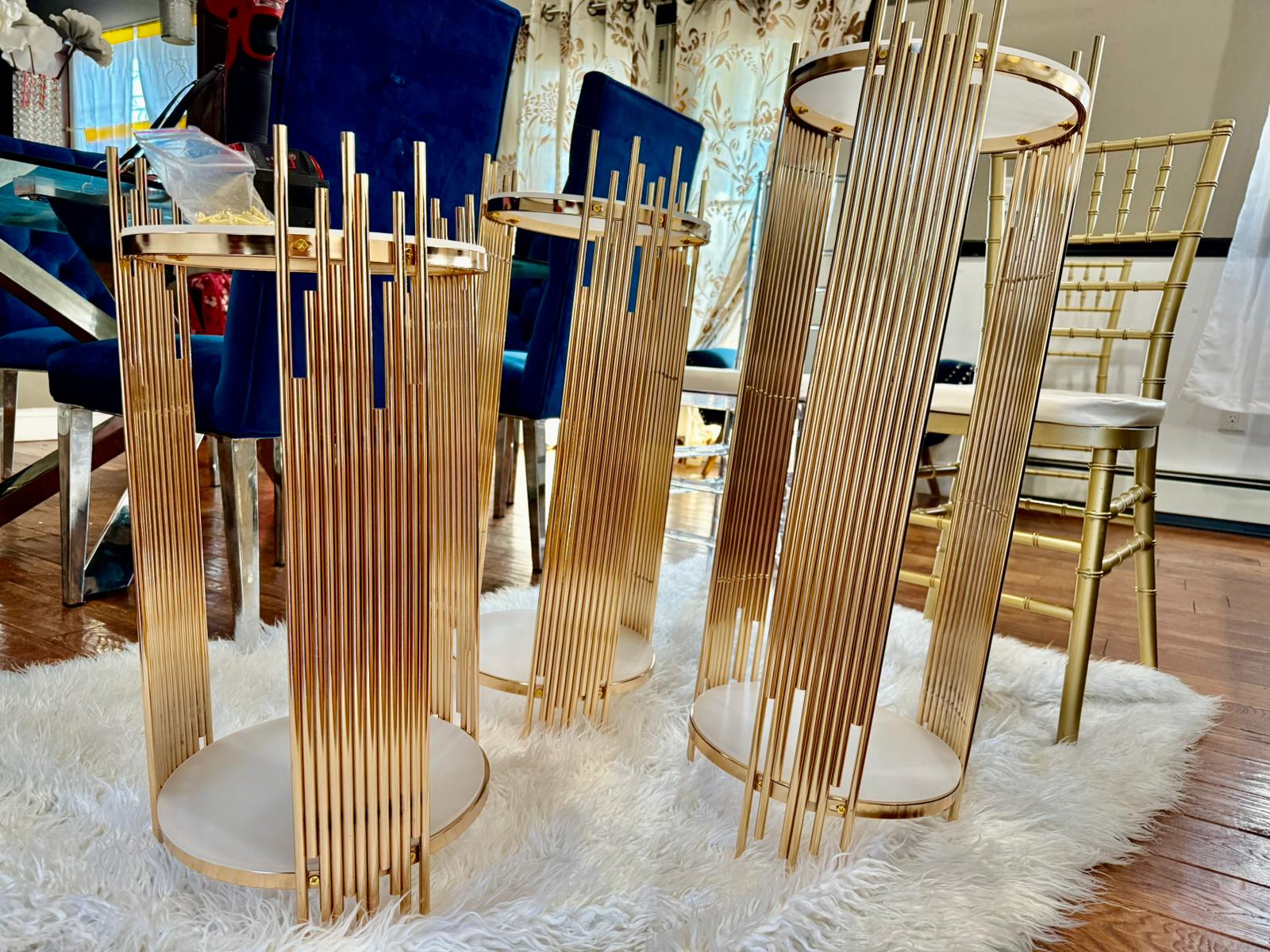 Gold plinths round display stand